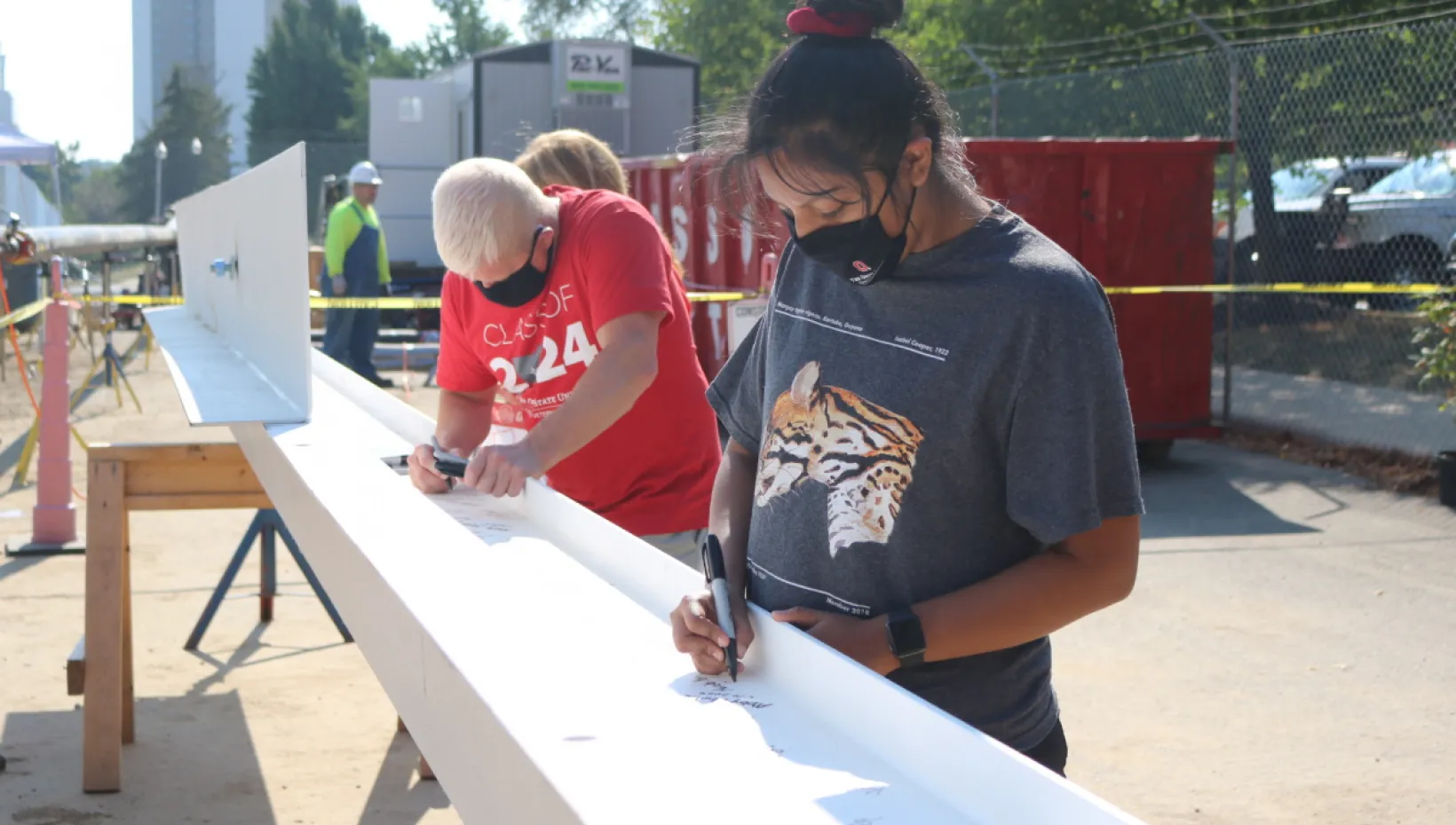 moore signing beam with student 