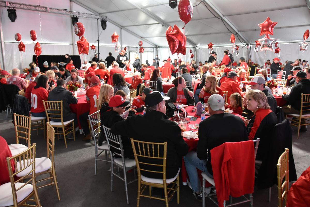 Alumni, family, and friends, gathered together for the college's traditional tailgate party before the kickoff of the Ohio State vs. Rutgers football game. The Buckeyes beat the Scarlet Knights 49-10.