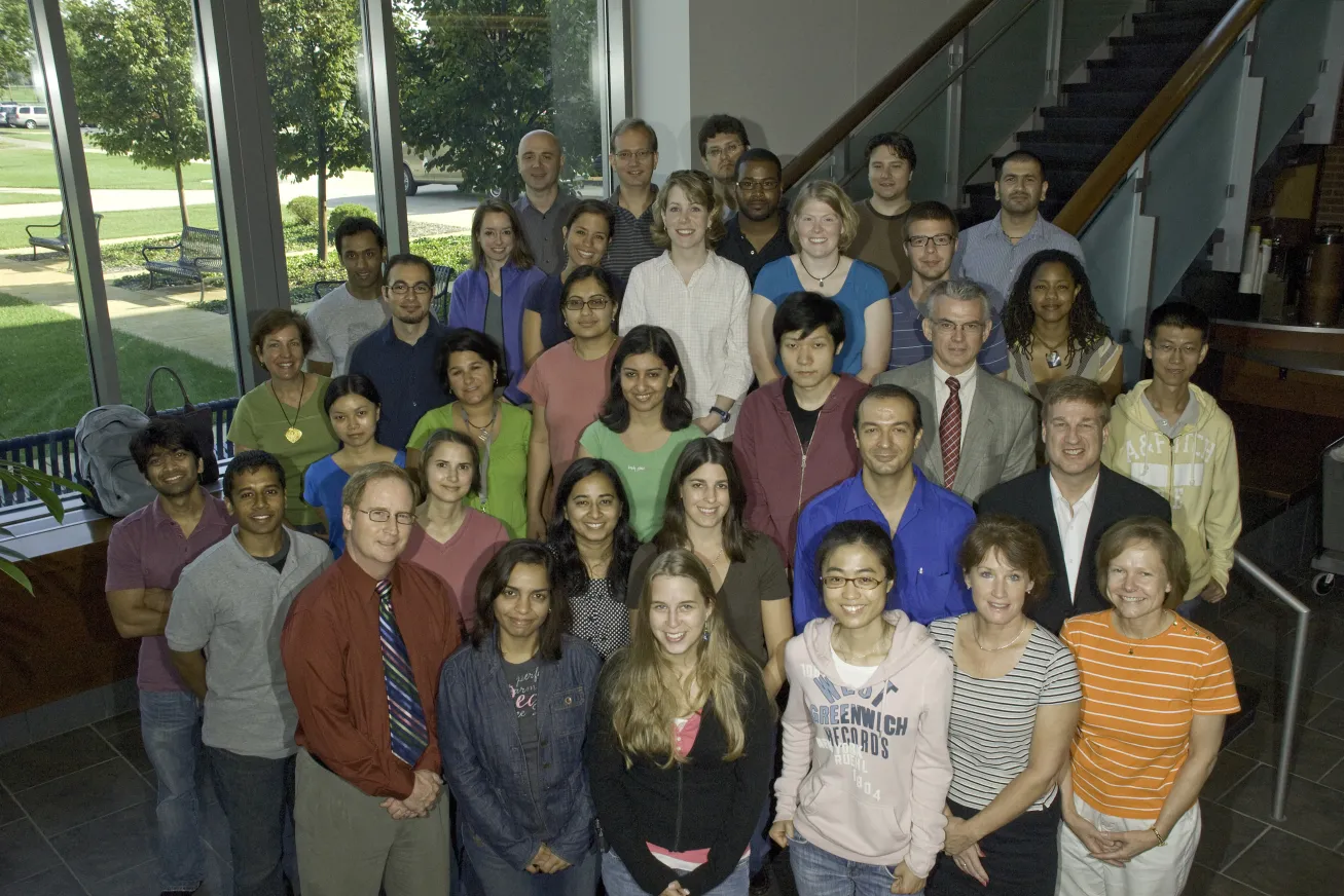 Center for Retrovirus Research Group Members in college lobby in 2009