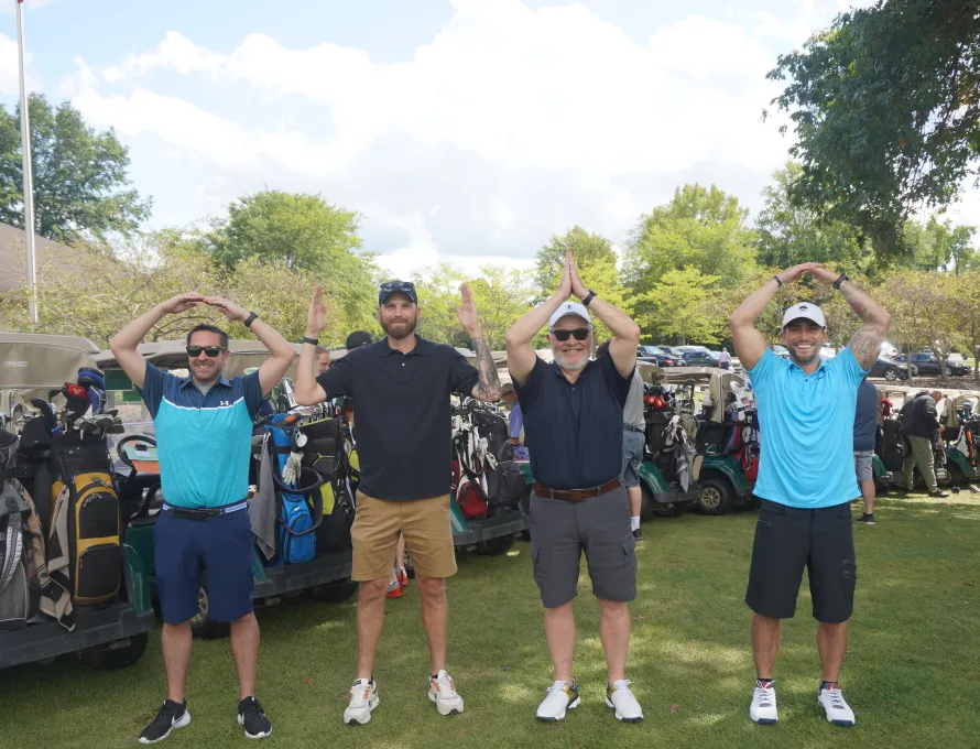 golfers spelling ohio with their arms