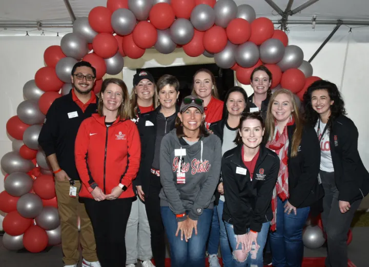 people wearing ohio state apparel during homecoming